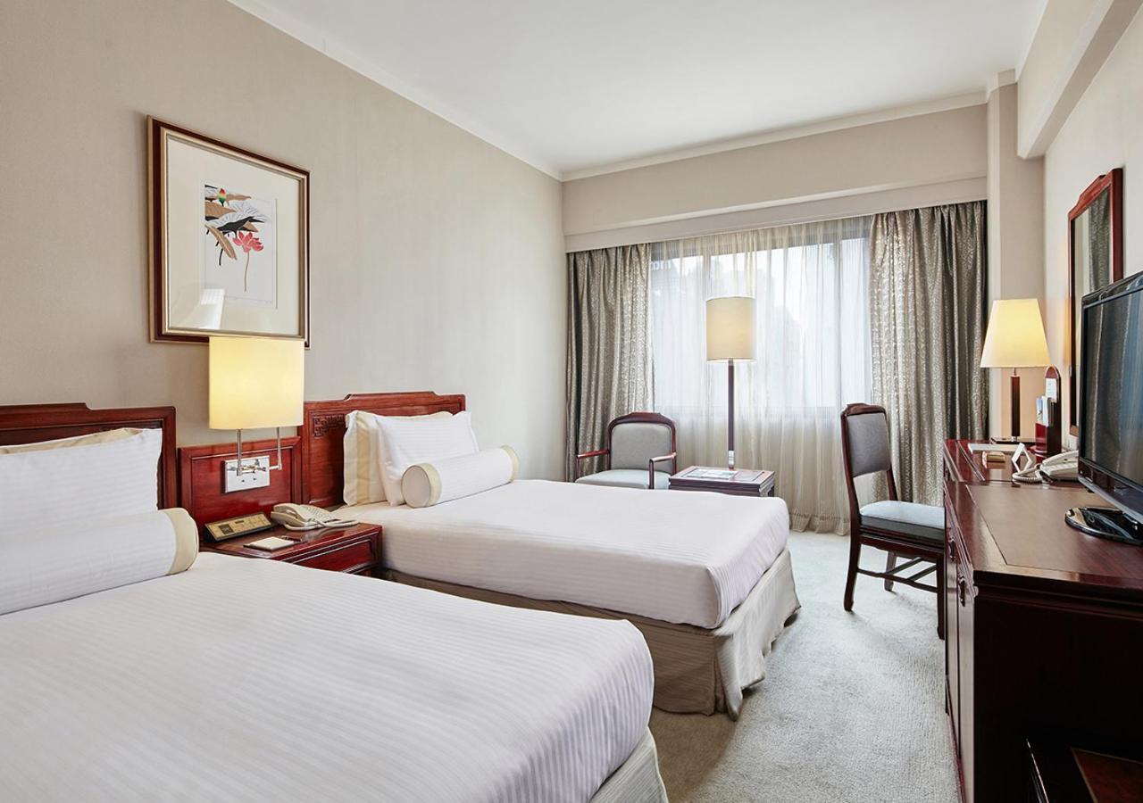 The Howard Plaza Hotel Тайбэй Номер фото A room at the hotel